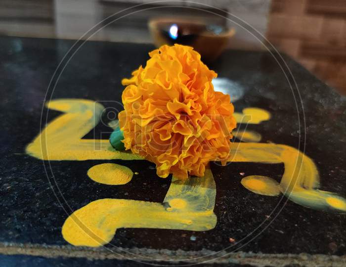 Swastik, with marigold flower in diwali
