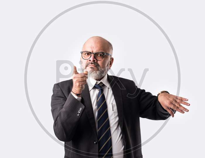 Indian Asian Senior Punctual Businessman Showing Wrist Watch - Time Is Money Concept
