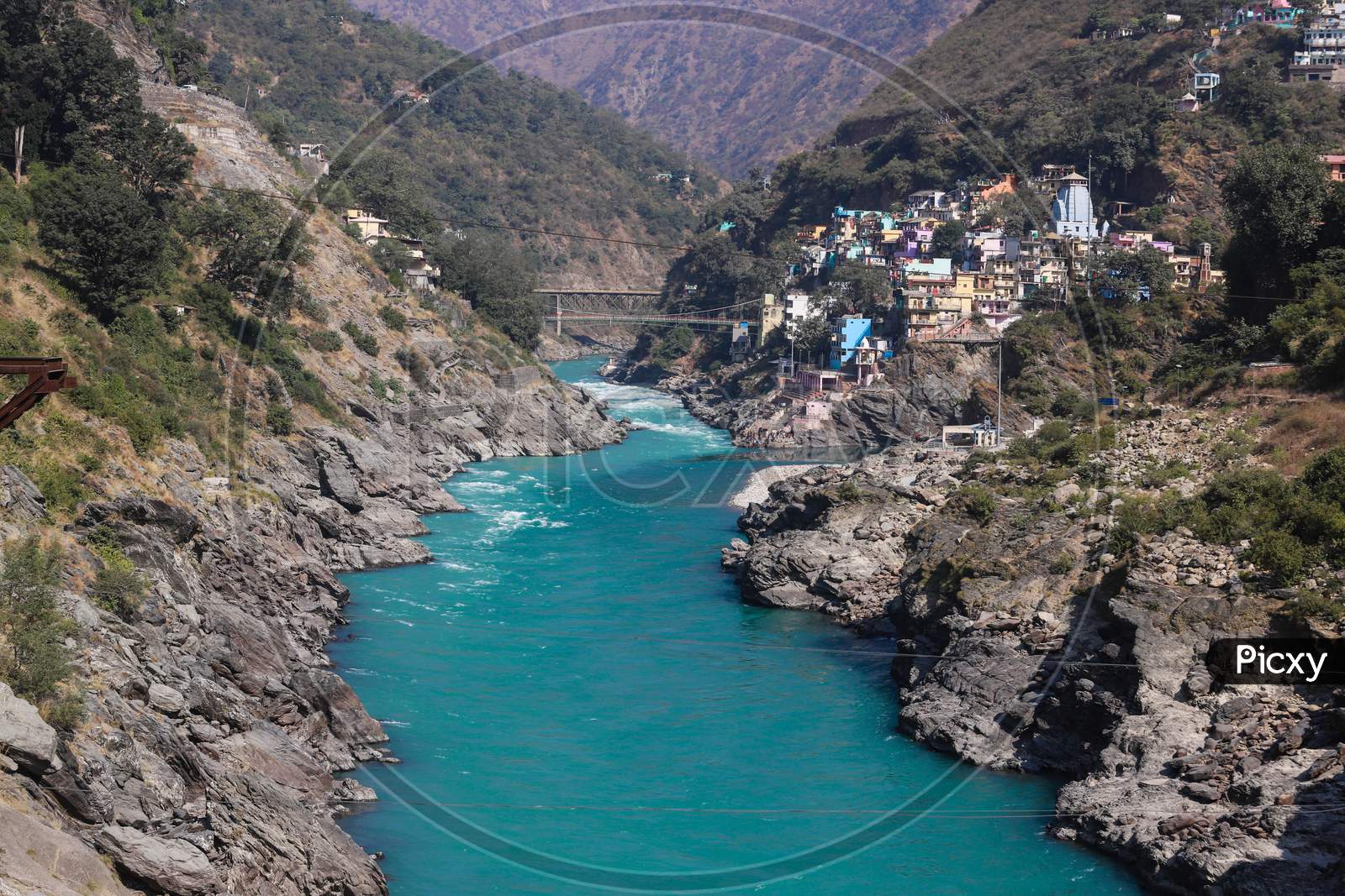 The confluence of Alaknanda and Bhagirathi rivers, which is officially accepted as the start of the River Ganges, in the town of Devprayag, Uttarakhand. For many Hindus, life is incomplete without bathing in it at least once in their lifetime, washing away their sins.