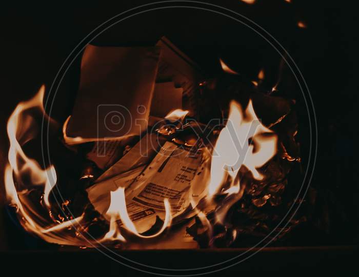 Burning papers