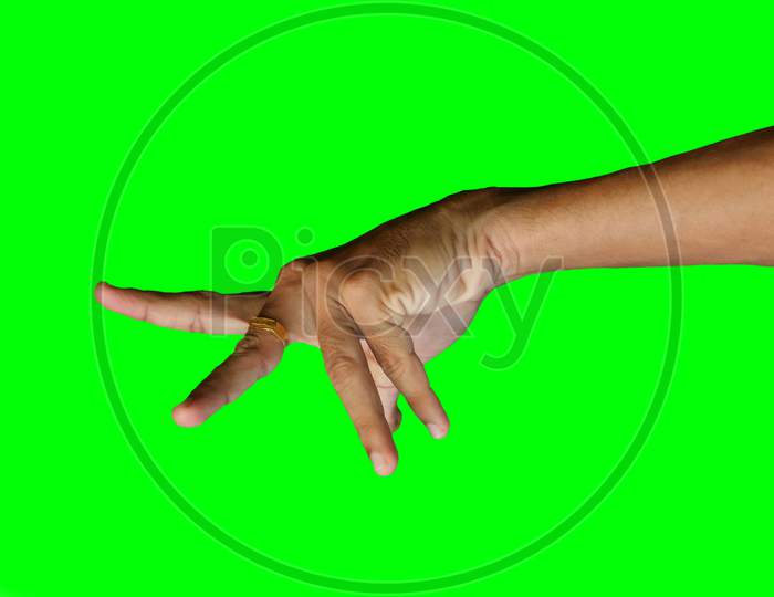 Closeup Of Human Hand Isolated On Green Background