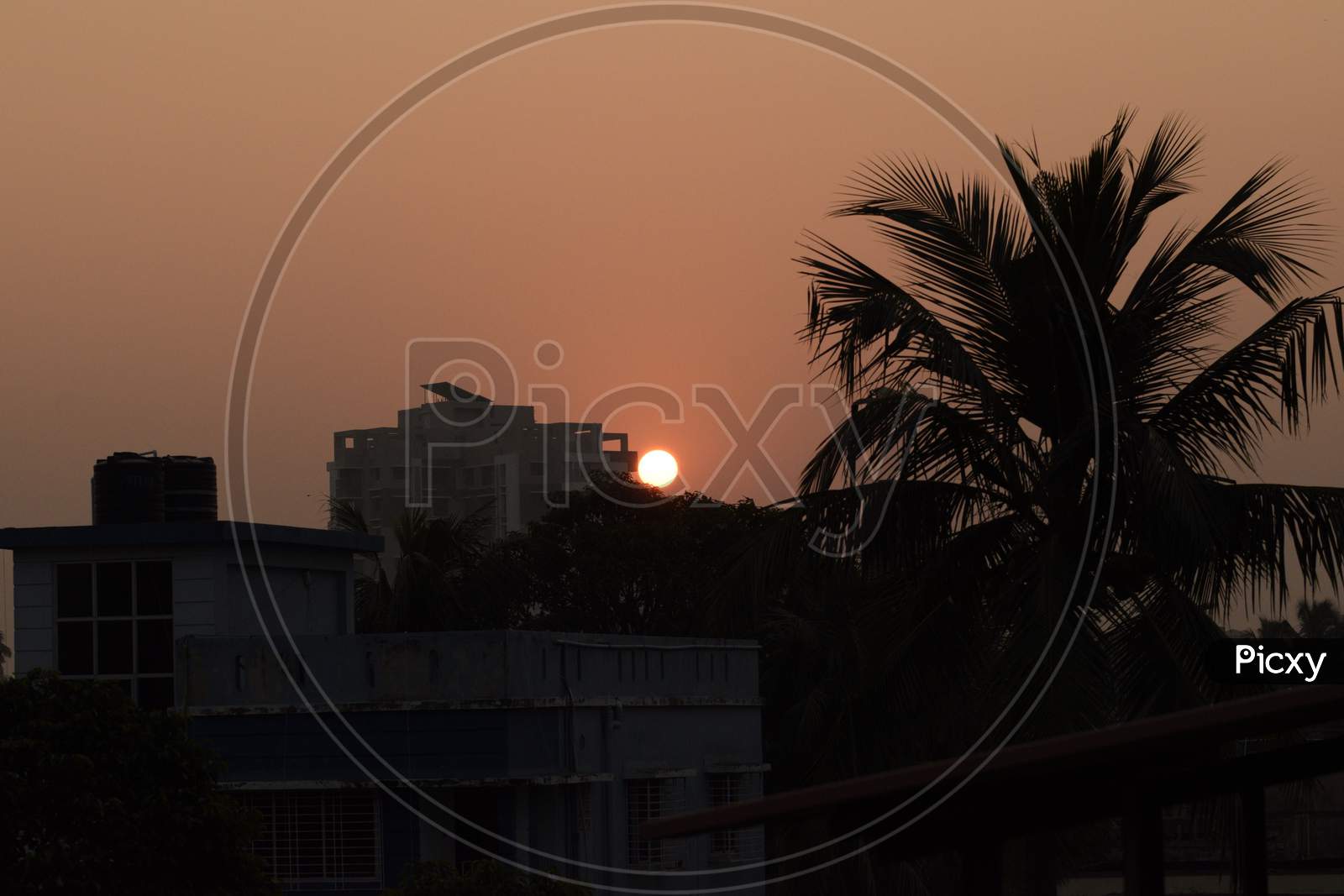 image-of-sunrise-over-the-horizon-at-the-suburbs-of-kolkata-im666831-picxy