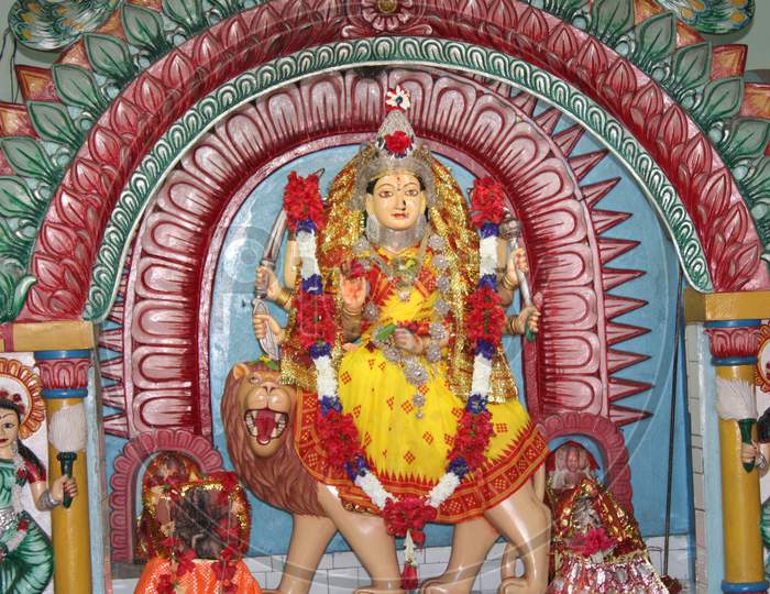 Maa Druga Indian Hindu Goddess Sitting On The Lion.