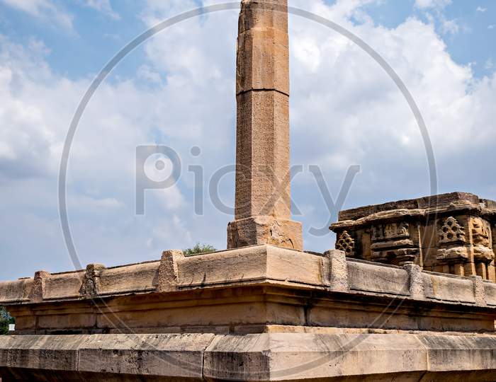Stone Pillar In Front Of Sanganeshwara Temple In Pattadakal Complex, Karnatataka, India.