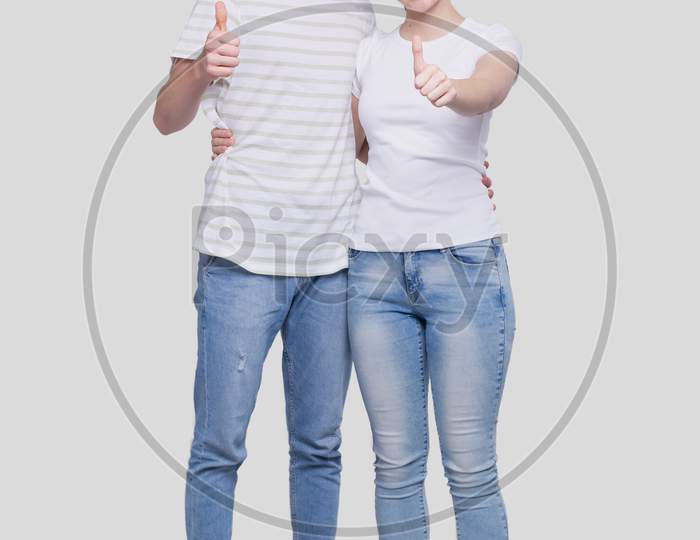 Couple Showing Thumb Up Standing Isolated. Man And Woman Hugging, Lovers, Friends, Couple Concept