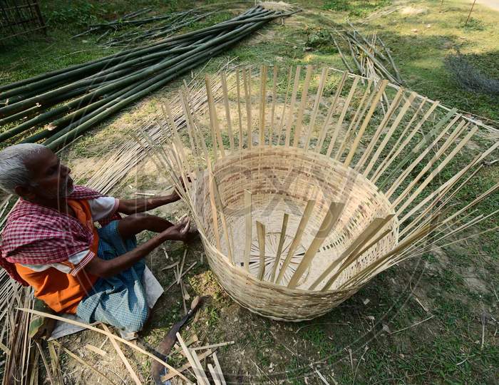 Villagers made Bamboo bucket locally called Duli at a village in Nagaon District of Assam on Nov 18,2020.