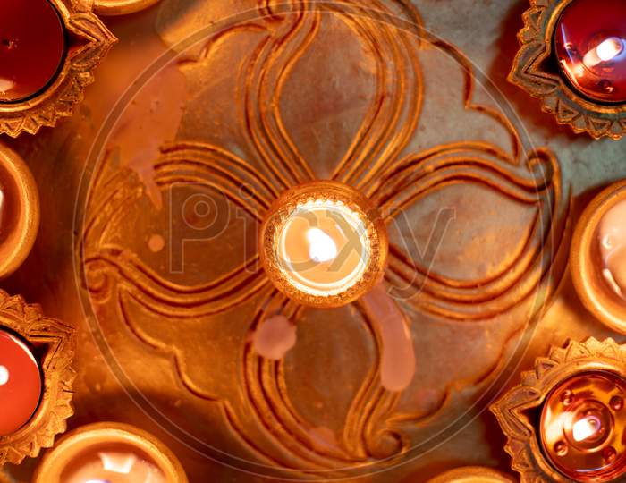 Macro Shot Showing Colorful Earthenware Diya Oil Lamps With A Little Cotton Wick To Burn Oil For Light Often Used As Decoration On The Hindu Festival Of Diwali