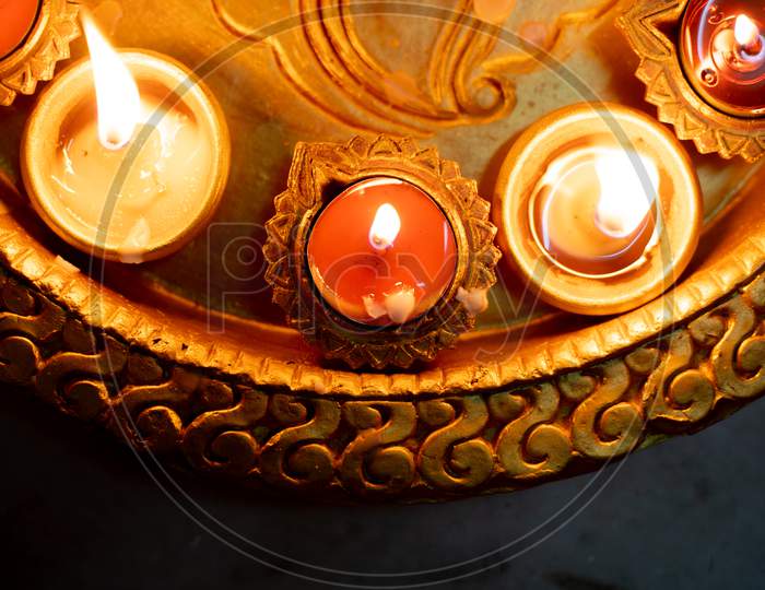 Half Frame Shot Showing Colorful Earthenware Diya Oil Lamps With A Little Cotton Wick To Burn Oil For Light Often Used As Decoration On The Hindu Festival Of Diwali