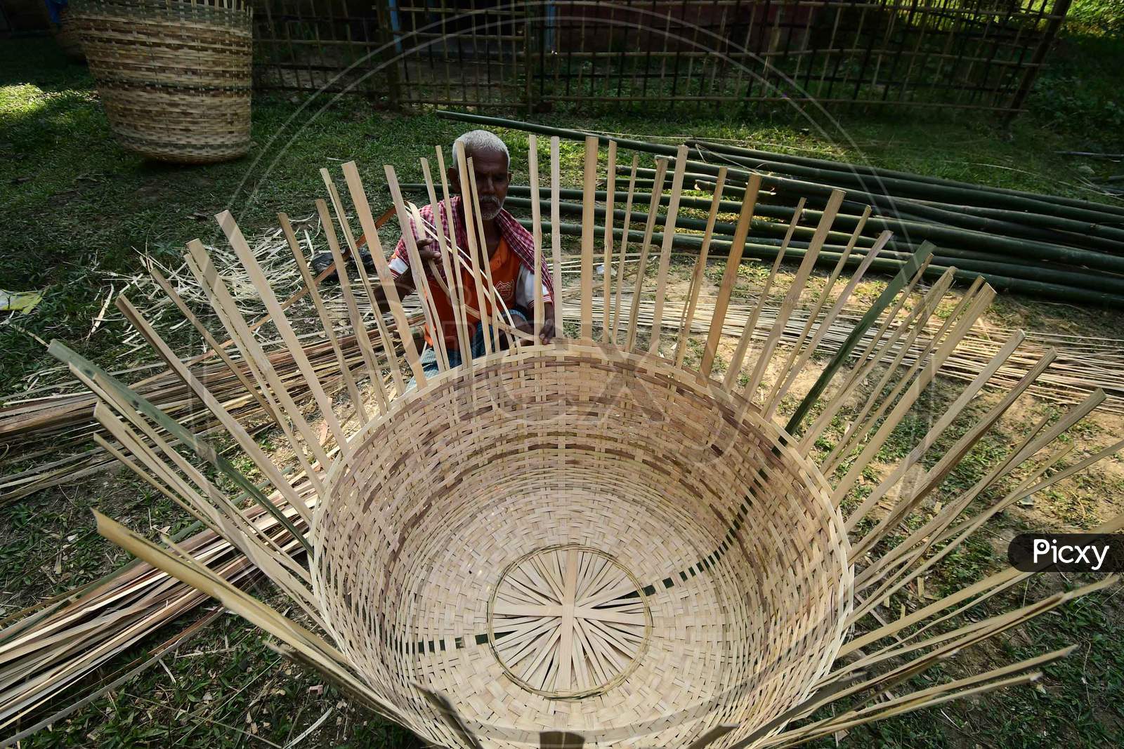 Villagers made Bamboo bucket locally called Duli at a village in Nagaon District of Assam on Nov 18,2020.