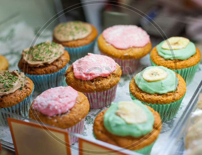 Multi Coloured Cupcakes For Sale And On Display
