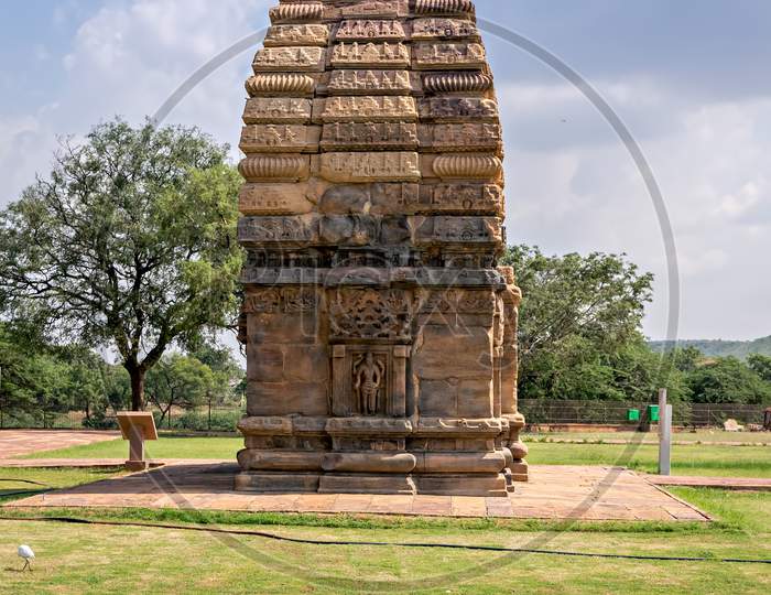 Ancient Stone Temple Monument & Tree At Pattadakal , Karnataka, India.