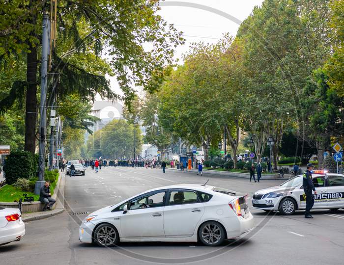1 November, 2020. Tbilisi.Republic Of Georgia. Closed Rustaveli Avenue Street  During Protest Wit Police Car Standing And Cars Turning Away