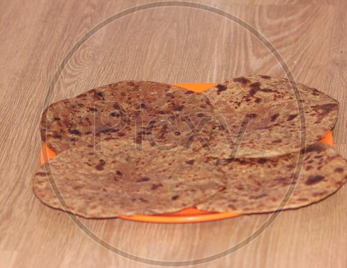 Traditional Paratha - Macro Closeup With Selective Focus Of Homemade Oily Bread