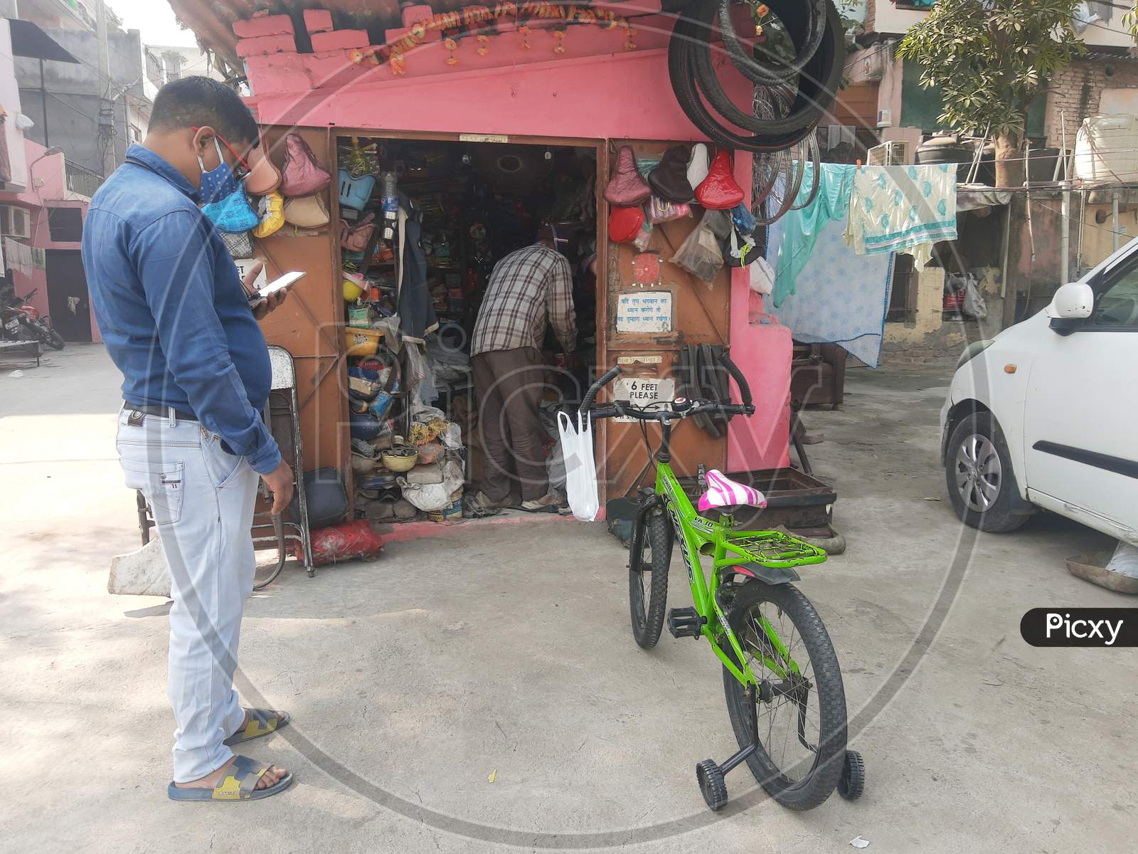 Cycle Mechanic Do Repairing Work At His Roadside Shop