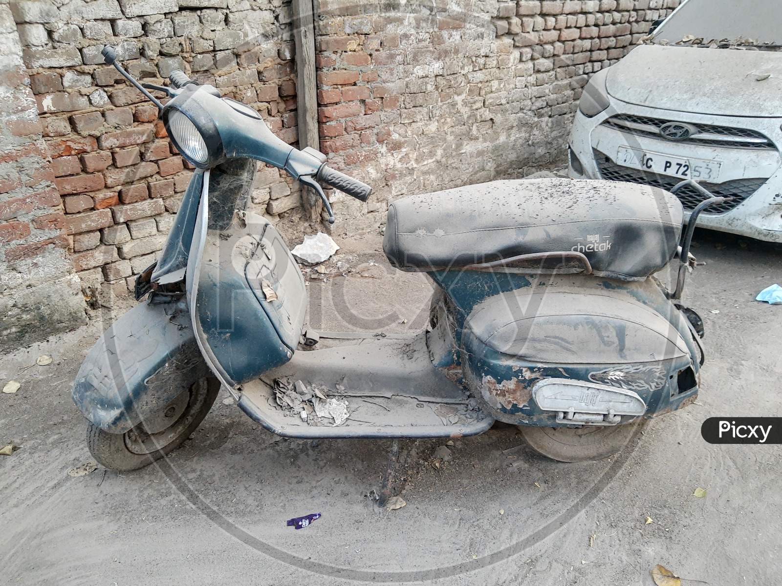 An Old Bajaj Scooter On The Street Of India