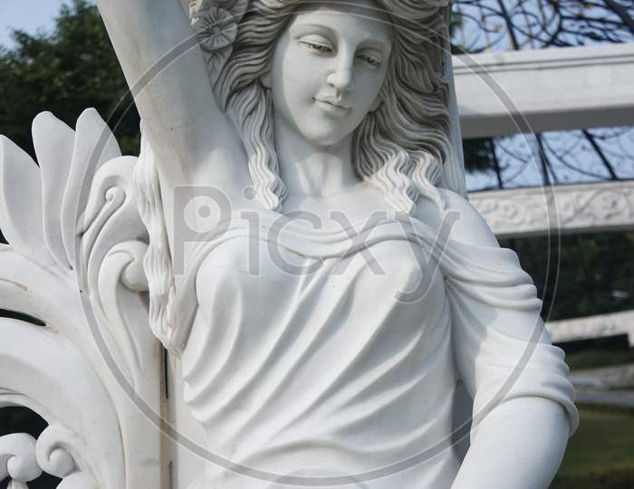 Statue Of Greek Goddess Head With Lovely Hair Settled In A Public Park