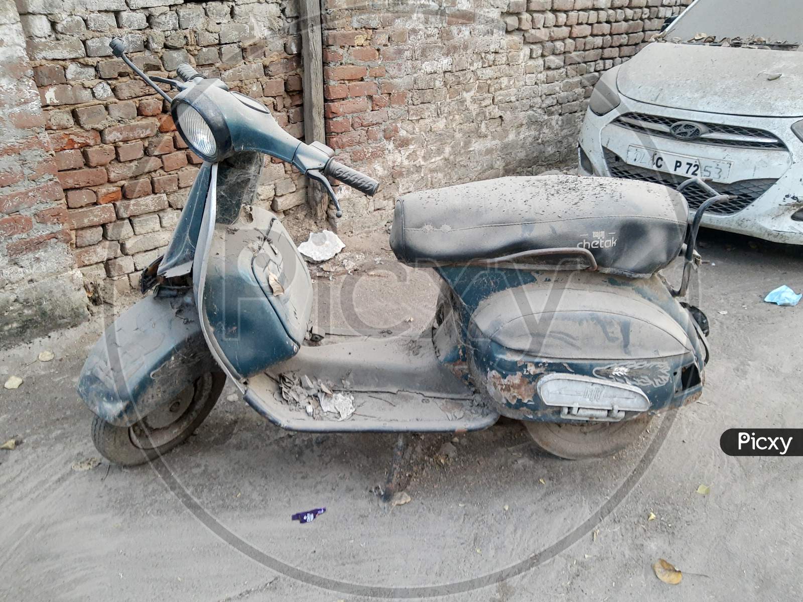An Old Bajaj Scooter On The Street Of India