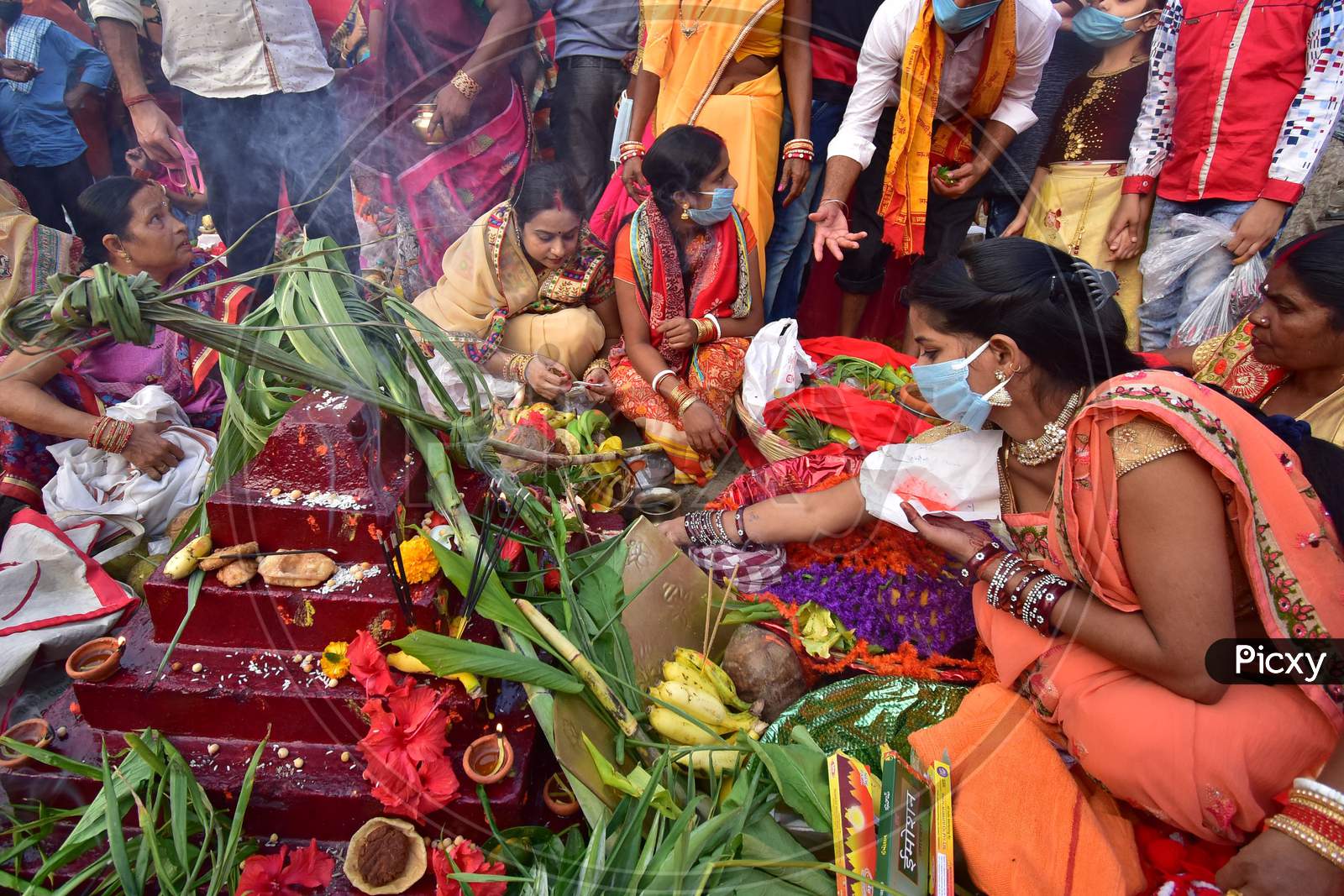Hindu devotees offer prayers to the Sun on the occasion of Chhath Puja festival in Nagaon district, in the northeastern state of Assam on Nov 20,2020