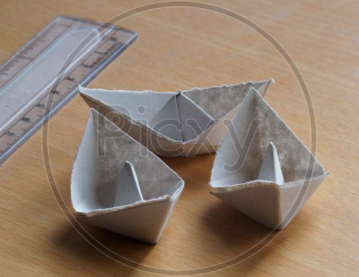 Paper Boats On The Table