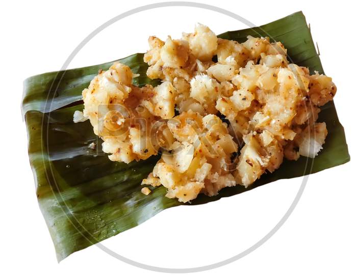 Delicious South Indian Food Cooked Tapioca / Cassava Root / Mandioca / Aipim With Grated Coconut In Earthen Ware Kerala, India