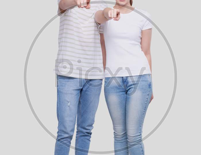 Couple Pointing To Camera Standing Isolated. Man And Woman Pointing, Lovers, Friends, Couple Concept