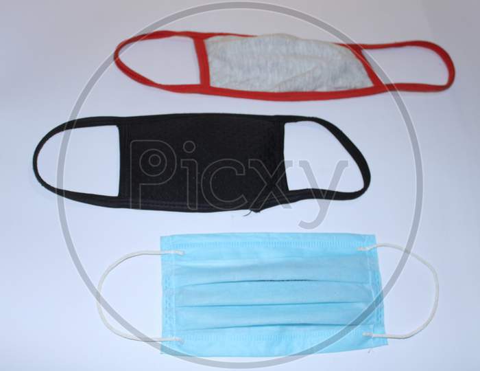 Surgical Mask, Cotton Mask Wit White Color Background. Three Colorfully Mask with coronavirous protected mask.