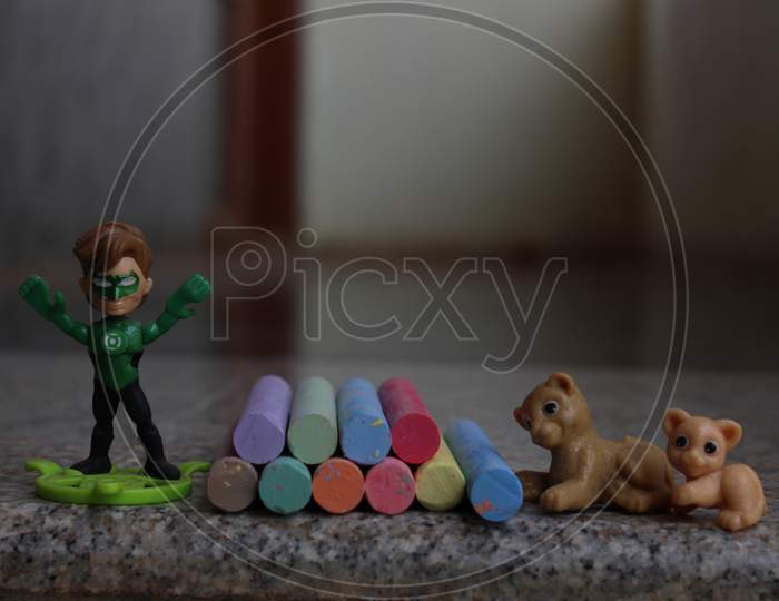 Colorful chalks & Superhero toy