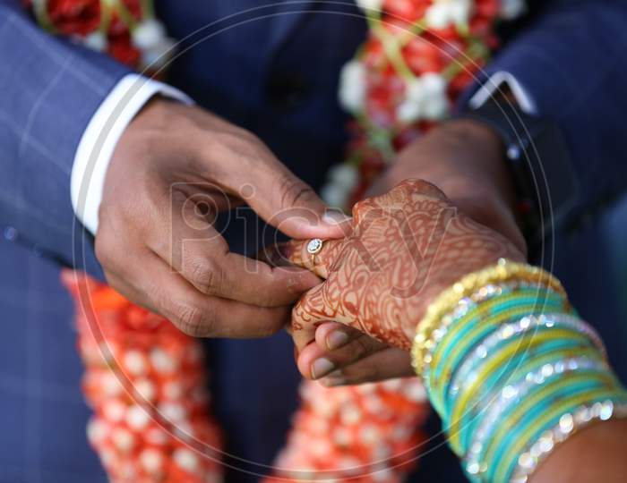 engagement rings hands closeup