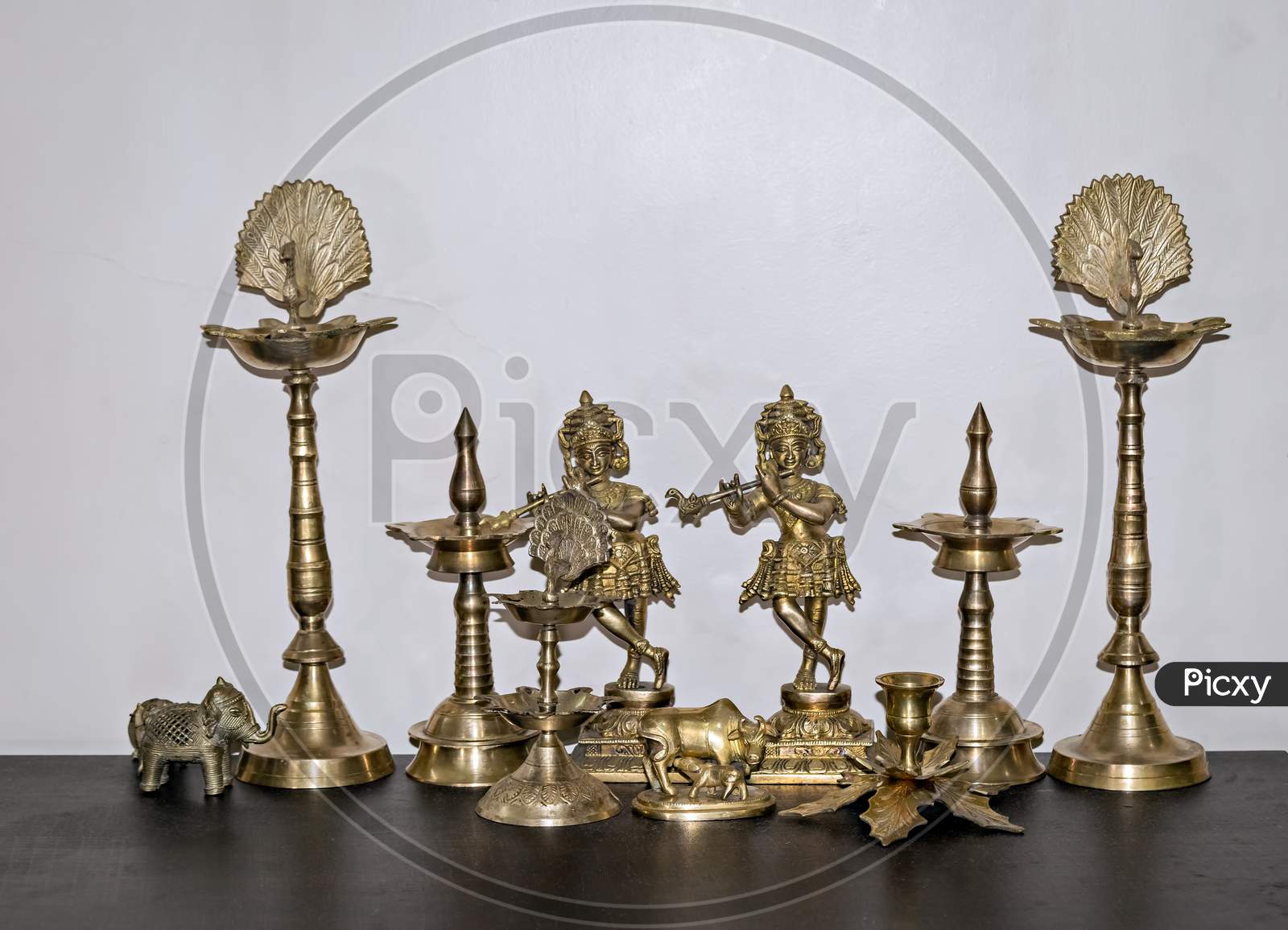 Assorted Indian Pooja articles items set made up of brass.