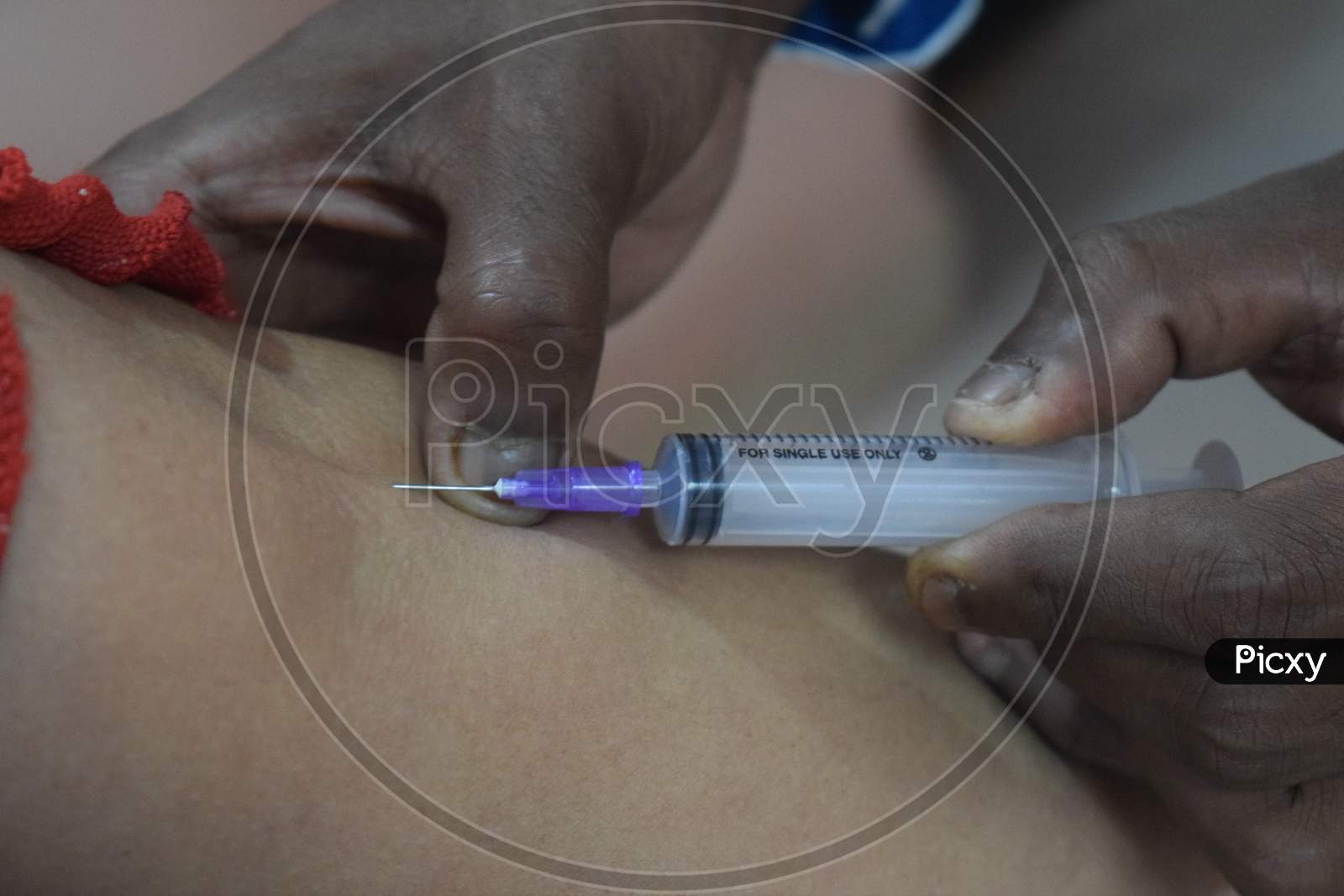 Doctor Hand Injecting Medical Insulin Syringe Pen
