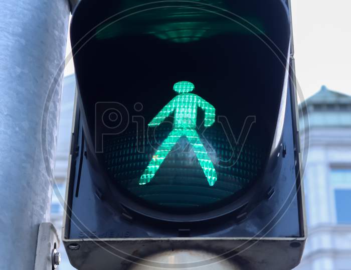 Green And Red Traffic Lights For Pedestrians And Cars