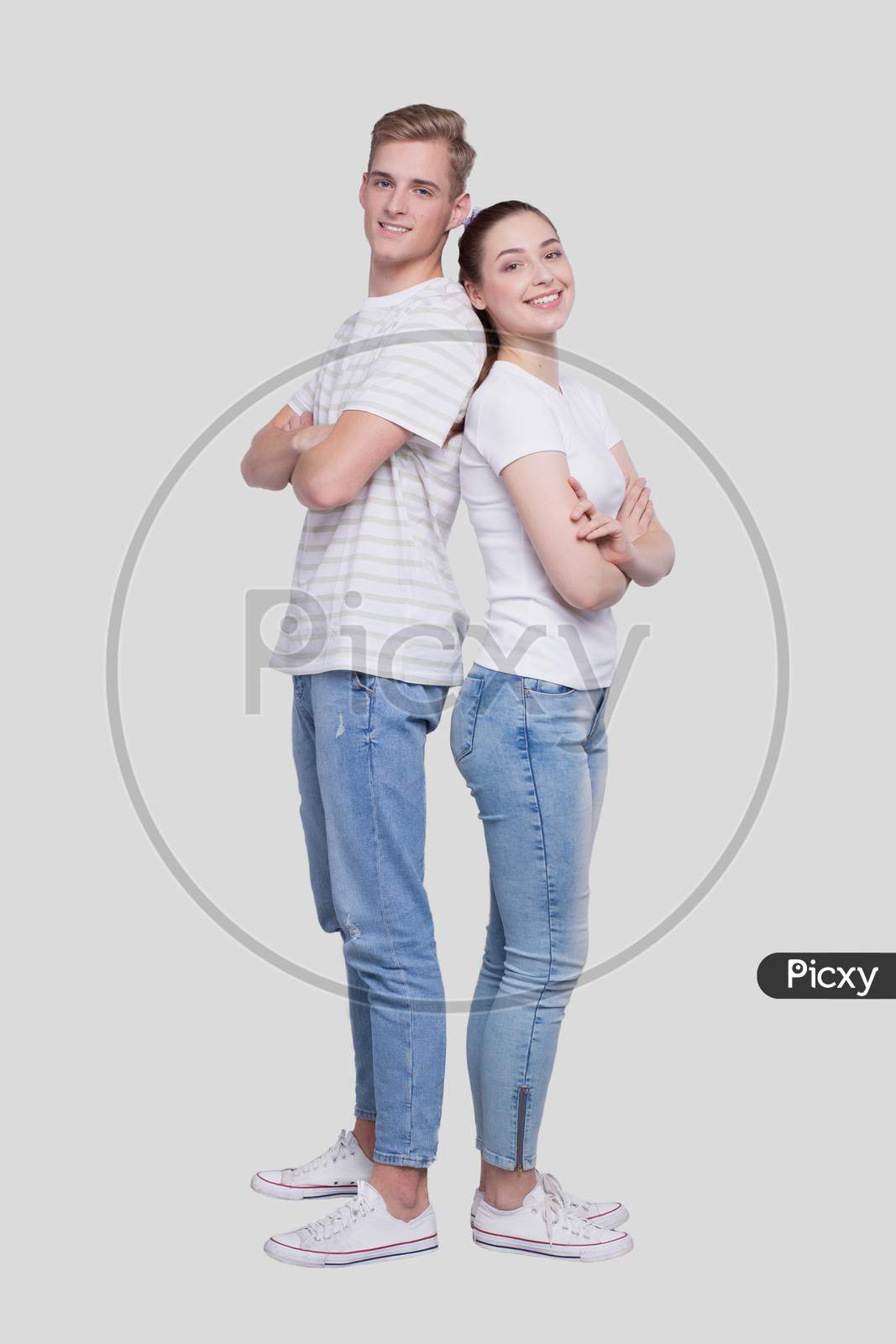 Couple Standing Back To Back Smilling Isolated. Man And Woman Hugging, Lovers, Friends, Couple Concept