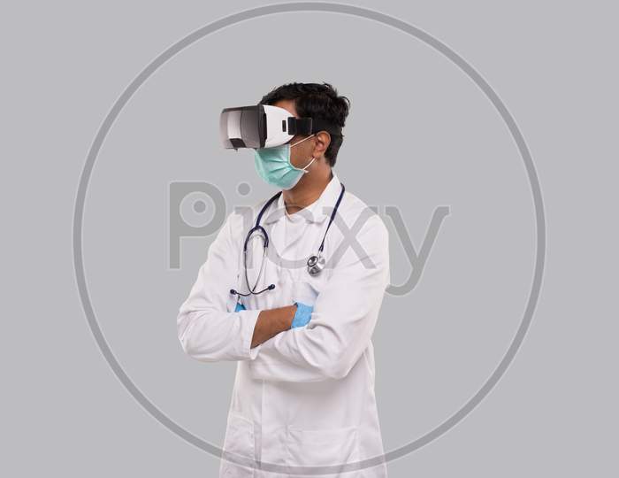 Doctor Wearing Vr Glasses, Medical Mask And Gloves Hands Grossed Isolated. Indian Man Doctor Online Medicine