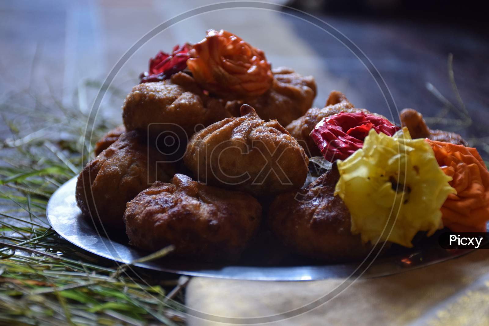Modak Or Sweet Fried Mo-Mos ,It Is A Traditional And Popular Indian Sweet Dish Made During The Ganpati Festival In India