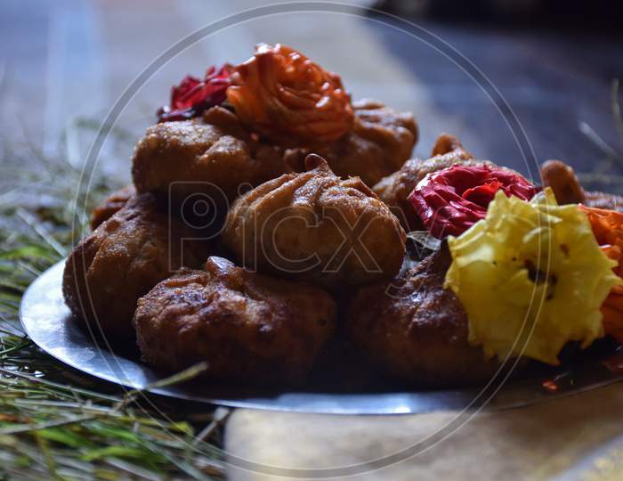 Modak Or Sweet Fried Mo-Mos ,It Is A Traditional And Popular Indian Sweet Dish Made During The Ganpati Festival In India
