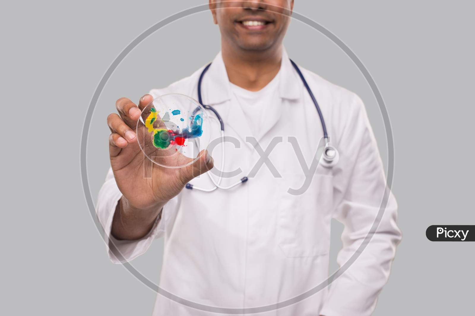 Doctor Holding Petri Dish Smilling Isolated Close Up. Medicine, Science Concept