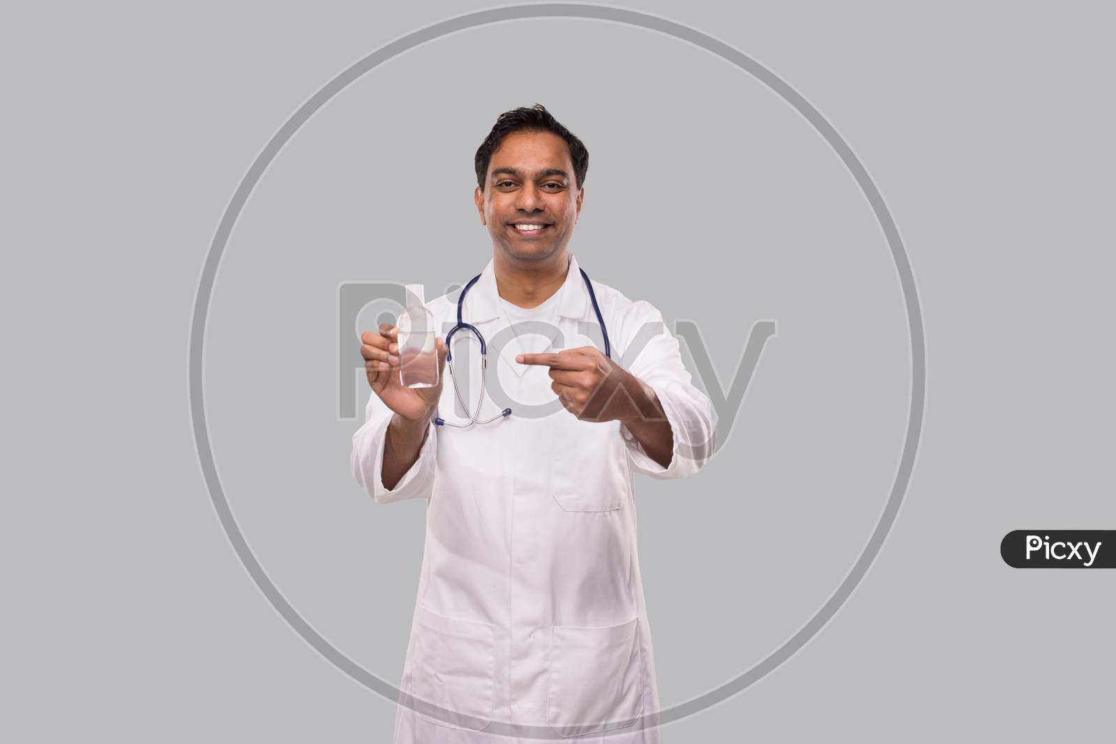 Doctor Pointing At Hands Sanitizer. Hands Wash Antiseptic. Corona Virus Concept. Isolated