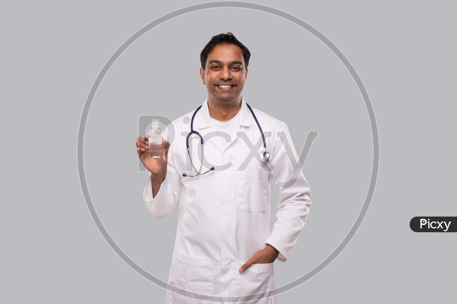 Indian Man Doctor Holding Hands Sanitizer. Hands Wash Antiseptic. Corona Virus Concept. Isolated
