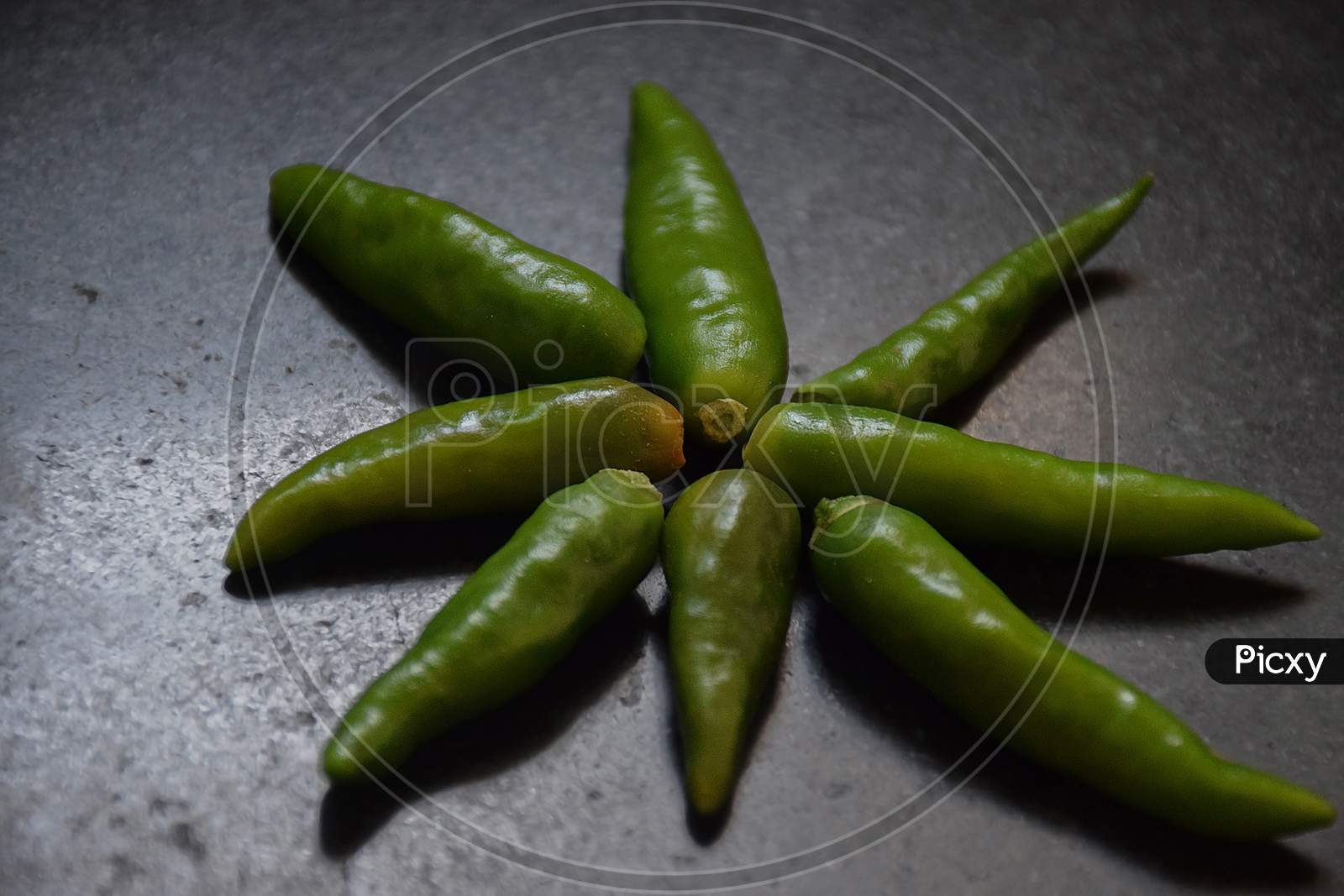 Picture Of Indian Hot And Spicy Green Chilli Decor With Star Shape