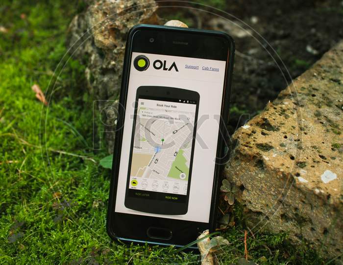Ola App Booking Cabs From Smarthphon