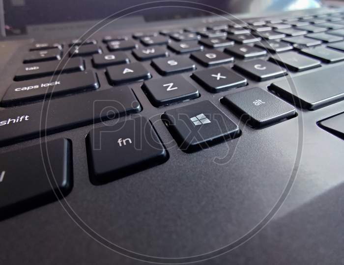 Close Up Picture Of Black Keyboard Of A Laptop