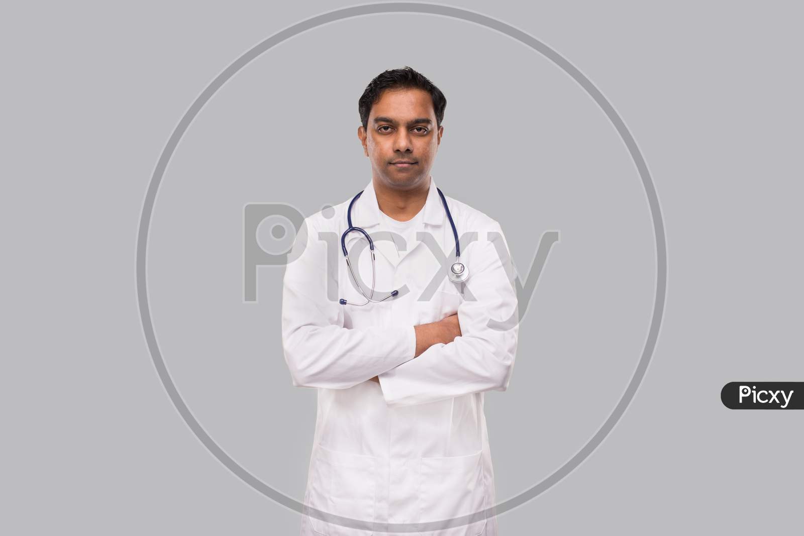 Doctor Serious Face Hands Crossed Isolated. Healthy Life, Medicine Concept.