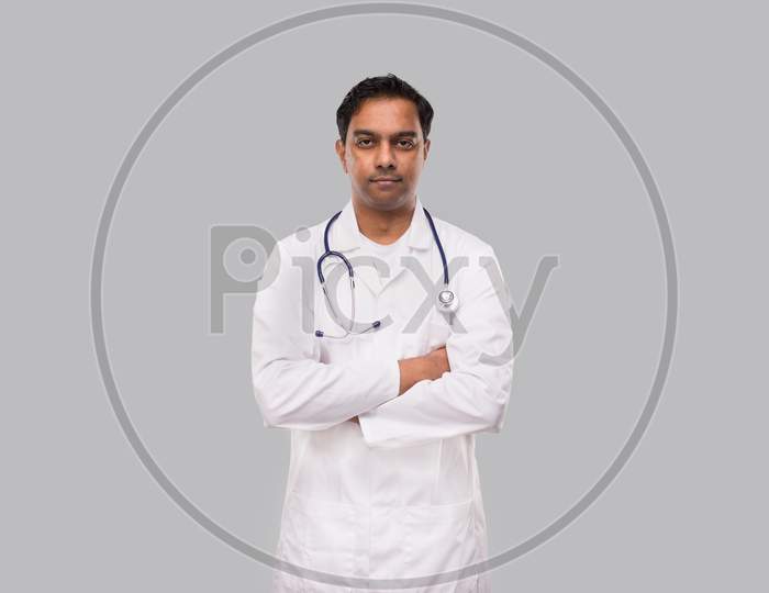 Doctor Serious Face Hands Crossed Isolated. Healthy Life, Medicine Concept.