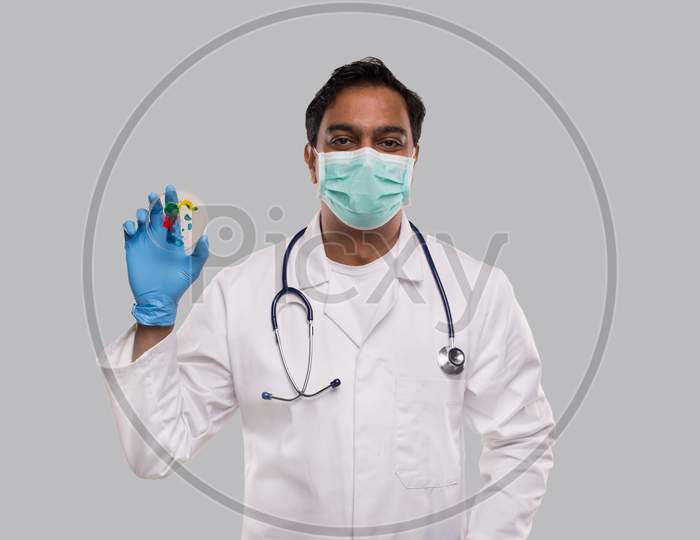 Doctor Holding Petri Dish Wearing Medical Mask And Gloves Isolated. Medicine, Science Concept