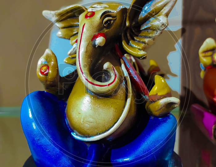 Colorful Artistic Figurine Of Lord Ganesha.
