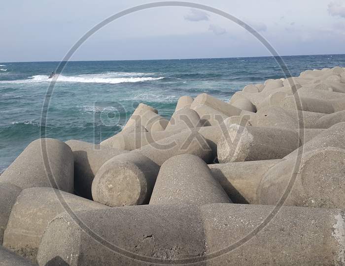 Tetrapod Stones On The Sea Shore