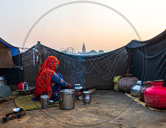 Nomadic Woman Making Food At Pushkar Camel Festival.