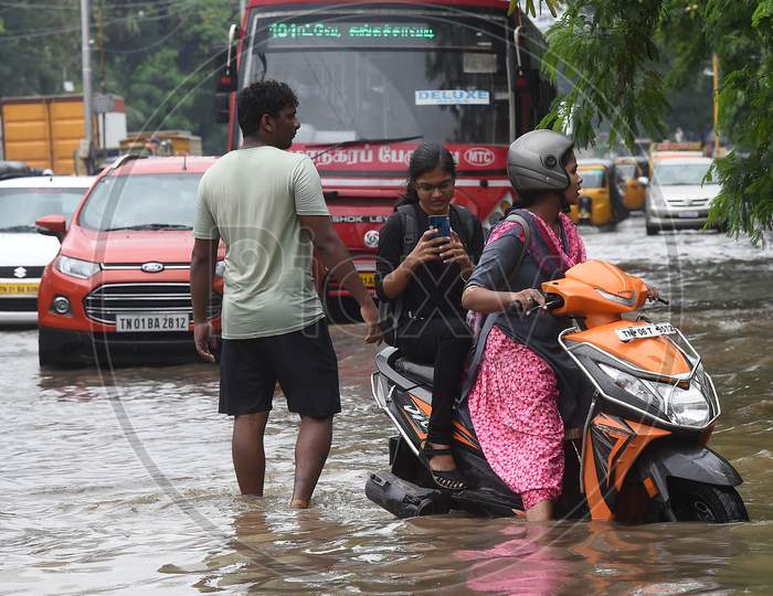 Commuters On A Bike During Heavy Rain Triggered By Cyclone Nivar, In Chennai, Tuesday, Nov. 24, 2020.