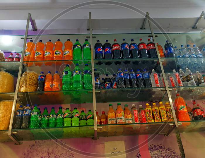 November 2020- Mahroli, Jaipur, India / Soda Soft Drinks In Refrigerator To Drink In Summer. Many Branded Soft Drinks In A Hotel.