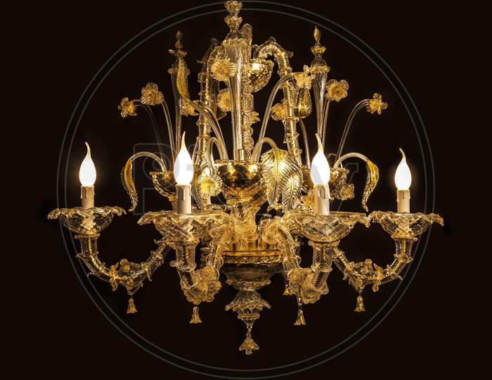 Beautiful Chandelier(Murano Italy) Isolated On Black Background.
